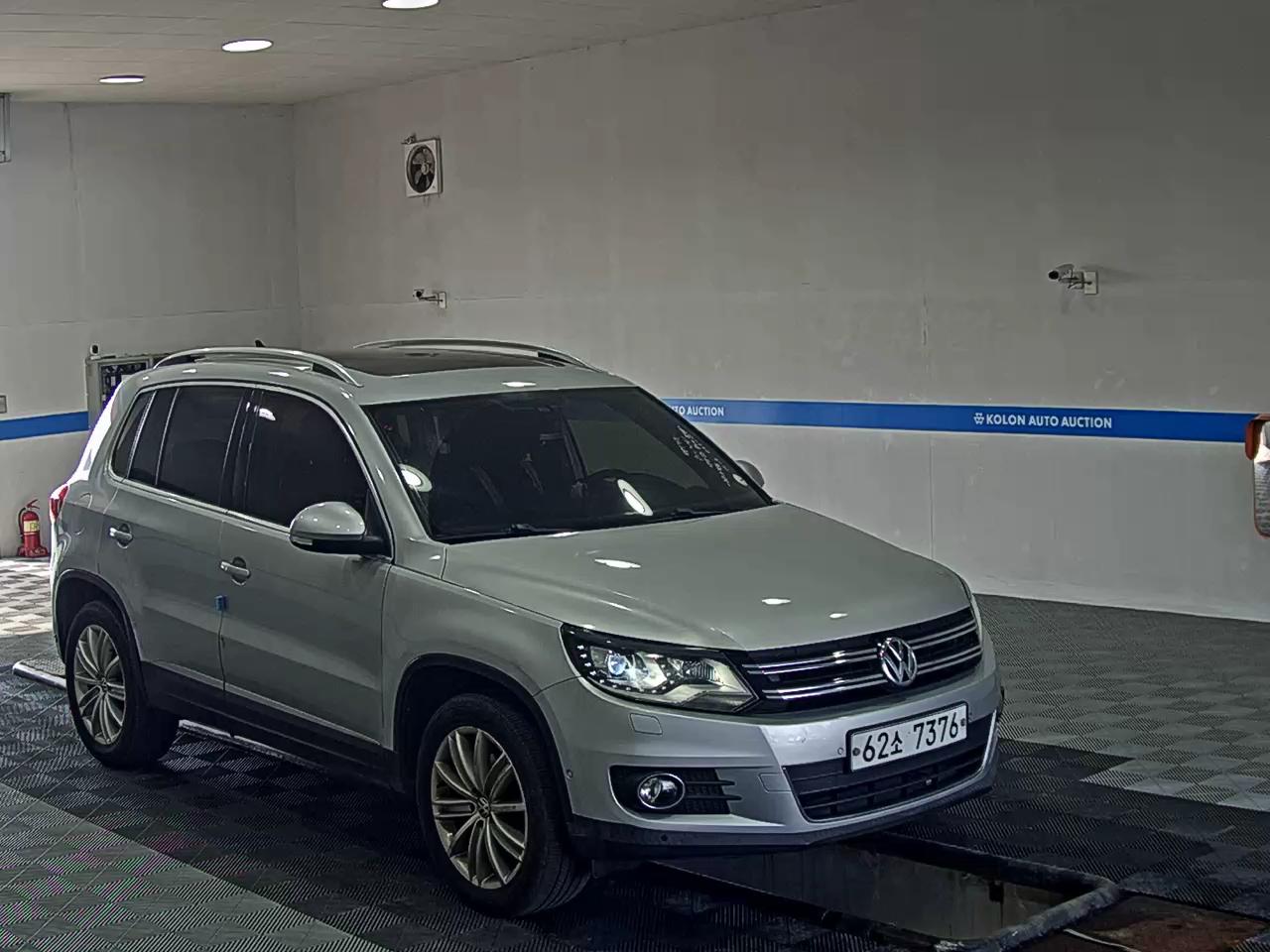 VOLKSWAGEN TIGUAN 2.0 TDI BLUEMOTION PREMIUM 2013 - zdjęcie 3